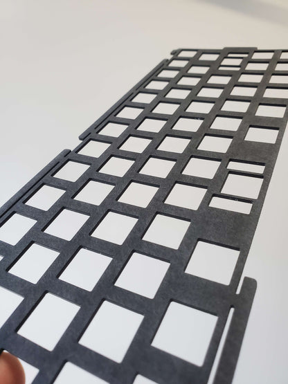 close up of sanded surface finish of laser cut black POM plate