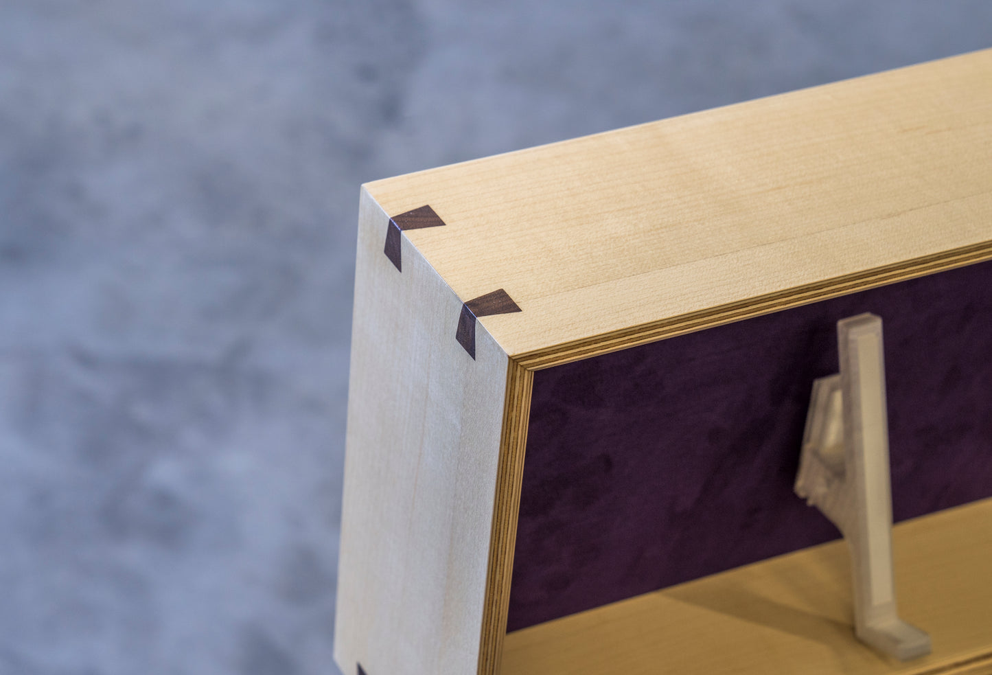 closeup of miter detail on a maple and purple keyboard display box