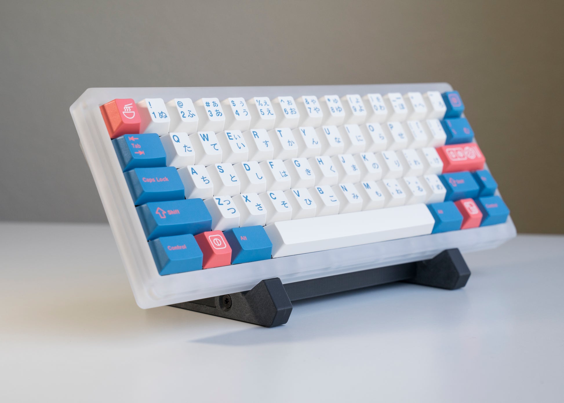 front of of black 3D printed PLA keyboard stand with silicone padding for mechanical keyboards with prop keyboard