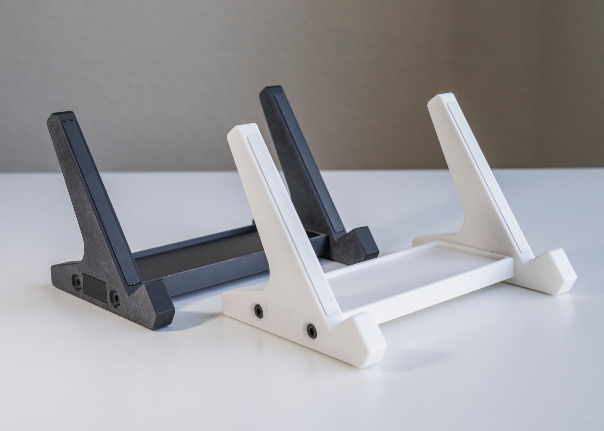 3D printed PLA keyboard stands with silicone padding for mechanical keyboards