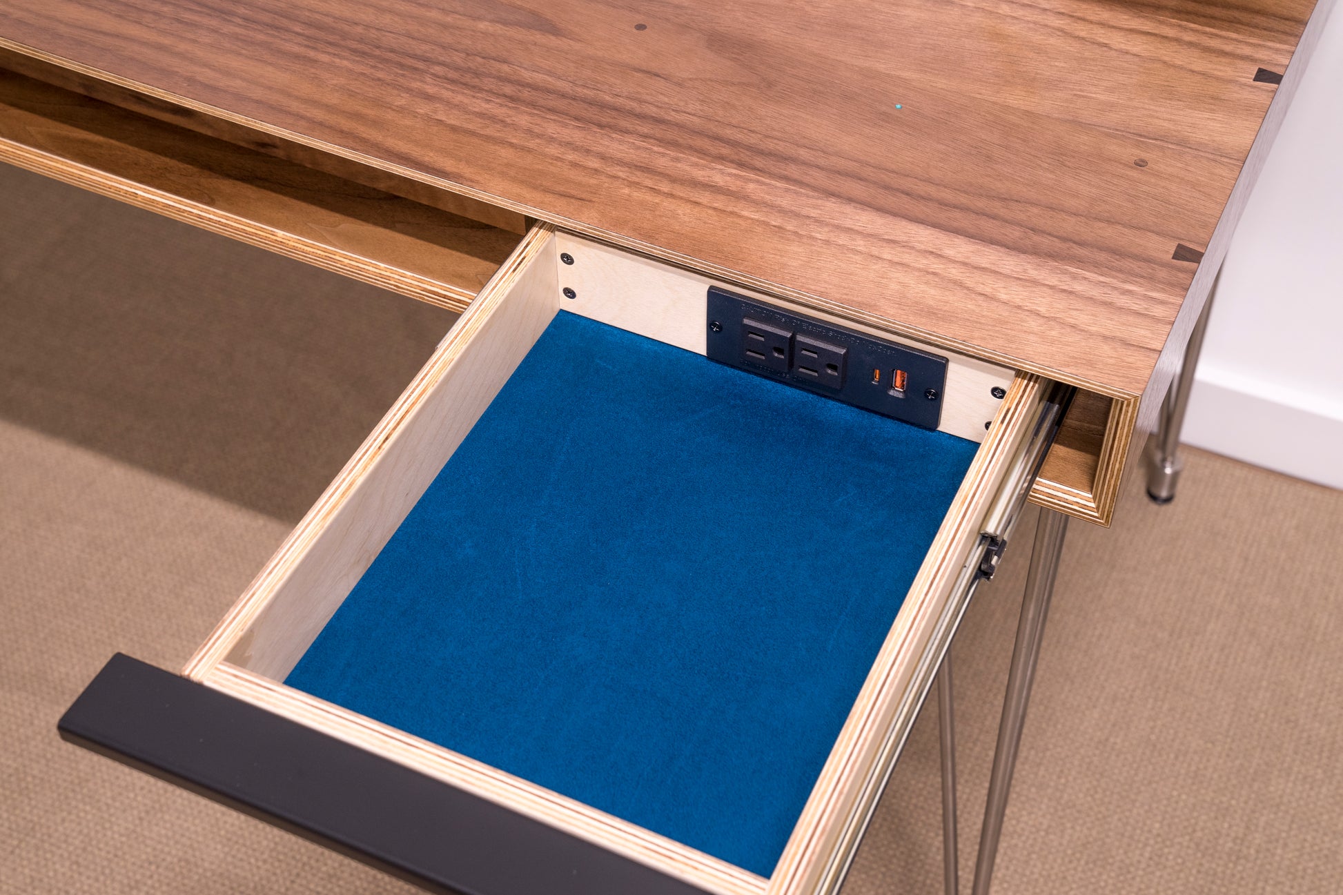 closeup of drawer with charging station inside 