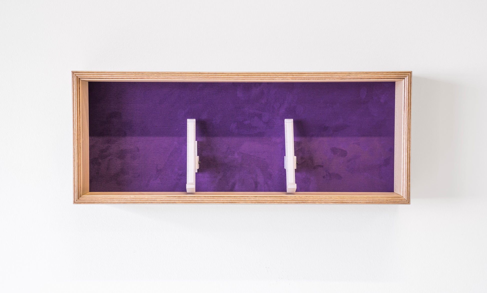 front view of maple and purple display box for mechanical keyboards