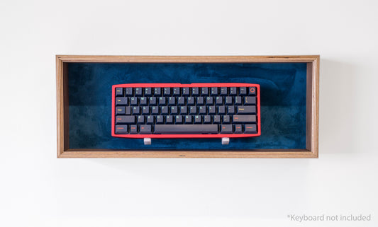 front view of walnut and navy display box for mechanical keyboards