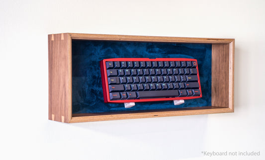 side view of walnut and navy display box for mechanical keyboards